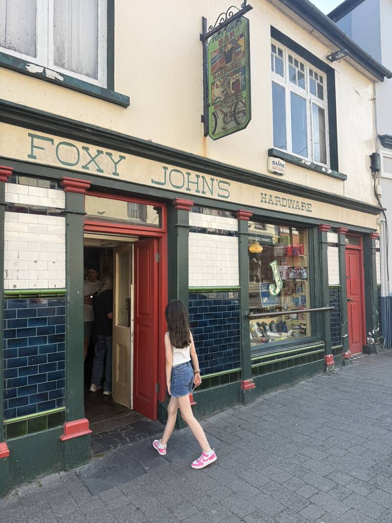 Walking into Foxy John's in Dingle